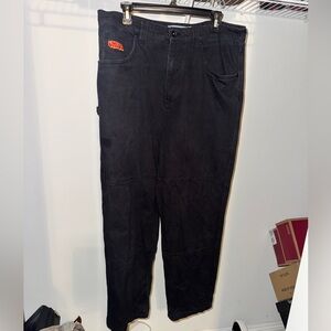 Empyre Loose Fit Embroidered Black Denim Skate Pants with vibrant logo